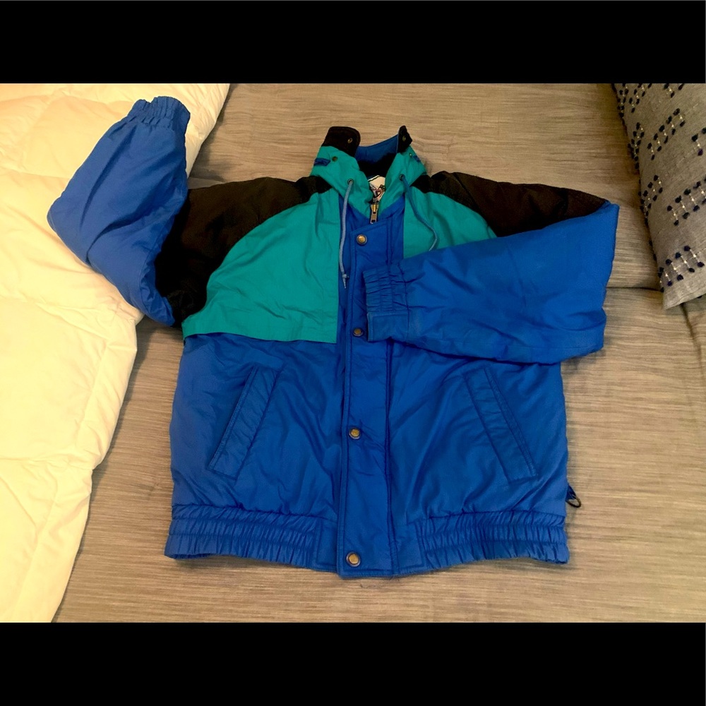 Men’s ski jacket. Warm. Waterproof. Colorful. Easy to spot on the mountain.